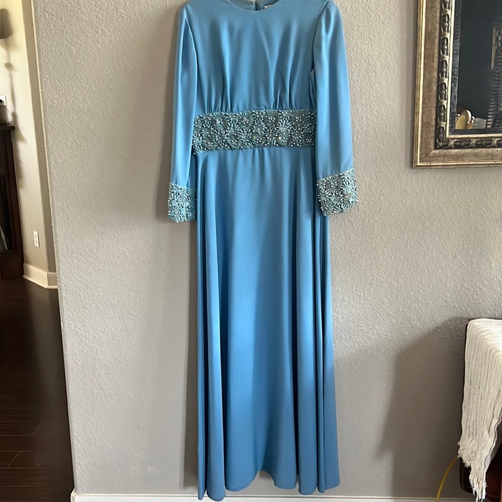 Vintage Carrie Couture Full length sky blue beaded gown fully lined.